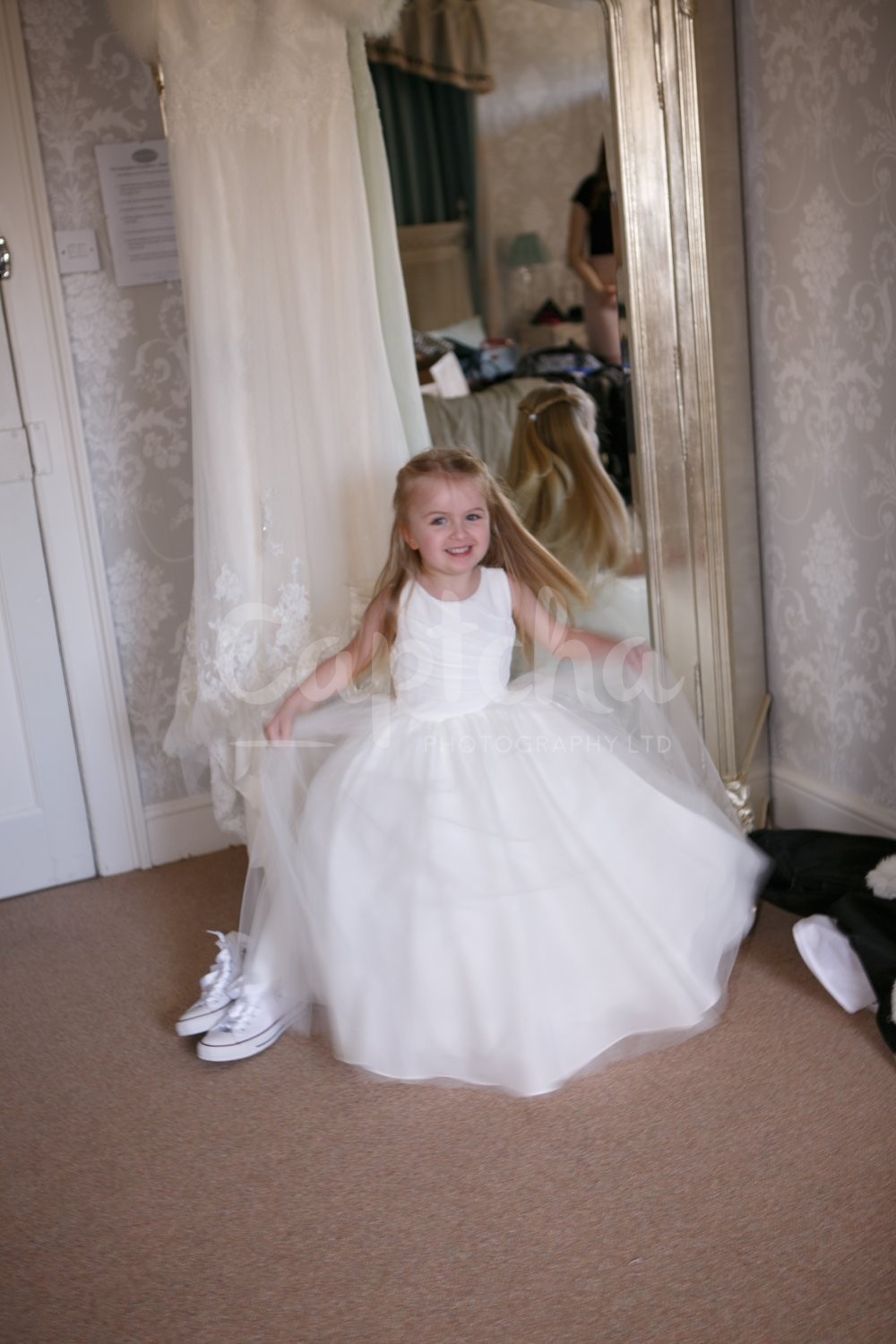 Its just as exciting as Christmas Bridesmaid, getting ready, excited, mirror, flowergirl, wedding, prestwold hall, photo